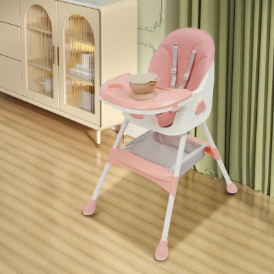 Chaise haute bébé pliante rose avec couverts